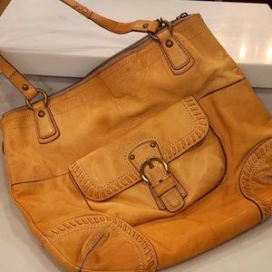 Cooach tan leather bag